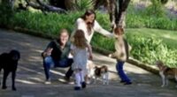 Lilibet's flowing long hair steals the show in Harry and Meghan's new holiday card after proud dad revealed she has been 'blessed with her mother's thick hair'