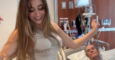 Model slammed for dancing gleefully next to her elderly boyfriend's hospital bed as she prepares to inherit his fortune