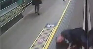 Moment passenger nearly dragged to his DEATH by train pulling into station as horrified travellers helplessly watch