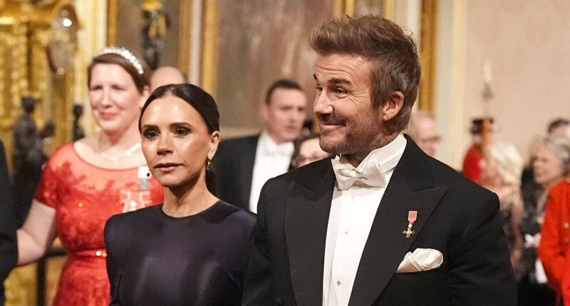 Posh's knight in shining armour! David Beckham beamed with pride as he gently guided wife Victoria through the King's Buckingham Palace Banquet... so are their invites a sign he's FINALLY back on the path to the knighthood he craves?