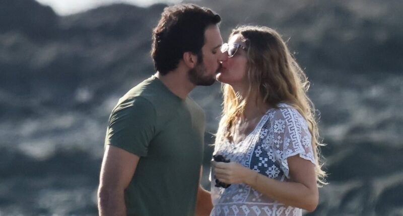 Pregnant Gisele Bundchen kisses Joaquim Valente on romantic trip to ex Tom Brady's favorite vacation spot