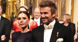 Proud David Beckham gives a reassuring hand to wife Victoria after she appears nervous as they join the royals at King's glittering state banquet for Qatar