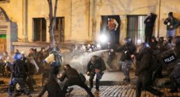 Riot cops fire tear gas at Georgia protesters hurling fireworks in 3rd night of violence against ‘pro-Putin’ regime