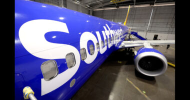 Southwest Airlines says it is ending cabin service earlier to reduce chance of injury