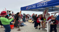 Surfing Santas & CPR: Holiday tradition teams up with local charity to save lives