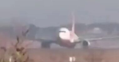 Terrifying footage shows doomed plane hurtling head on to concrete wall before bursting into flames killing 179 onboard