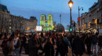 The Latest: The famed Notre Dame Cathedral in Paris reopens to great fanfare