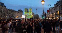 The Latest: The famed Notre Dame Cathedral in Paris reopens to great fanfare