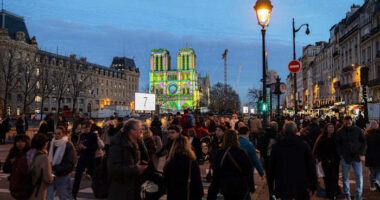 The Latest: The famed Notre Dame Cathedral in Paris reopens to great fanfare