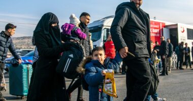 Thousands of Syrian refugees return home after brutal dictator Bashar al-Assad toppled by rebels