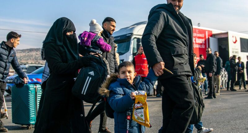 Thousands of Syrian refugees return home after brutal dictator Bashar al-Assad toppled by rebels