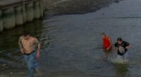 'Tradition is tradition': Ohio State fans plunge into the Maumee River after loss to Michigan