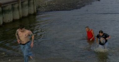 'Tradition is tradition': Ohio State fans plunge into the Maumee River after loss to Michigan