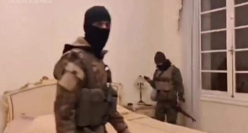 Watch Syrian rebels storm Assad’s palace and rifle through dictator’s bedroom drawers after seizing second city Aleppo