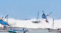 Watch terrifying moment massive freak waves batter Peru sweeping away boats & swamping seaside towns