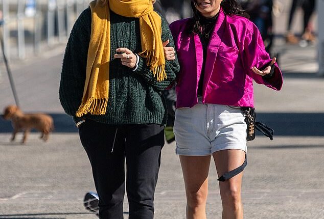 Anyone going for a walk in Sydney will have to rug up as the temperature plunges and strong winds linger (pictured: women in Bondi)