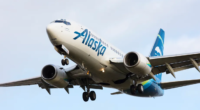 Woman climbs onto wing of Alaska Airlines plane at Seattle airport due to 'anxiety'