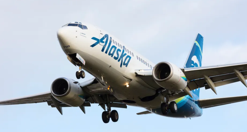 Woman climbs onto wing of Alaska Airlines plane at Seattle airport due to 'anxiety'