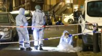 Woman in her 40s killed and man critically injured after triple shooting as police launch manhunt for gunman