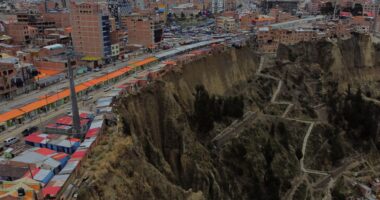 World’s scariest street of ‘suicide homes’ inches away from plunging onto razor rocks down 200ft cliff…which is ERODING