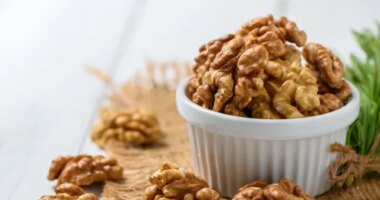 walnuts in bowl, concept of best nuts for weight loss