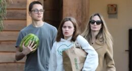 Angelina Jolie's son Knox towers over her on grocery store trip after her $80million Brad Pitt divorce victory