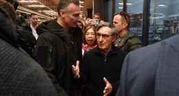 Trevor Sofield (centre) confronted Scott Morrison to express his disappointment at China's security deal with the Solomon Islands