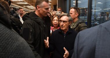 Trevor Sofield (centre) confronted Scott Morrison to express his disappointment at China's security deal with the Solomon Islands