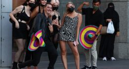 Even young, healthy people  have presented for treatment of long Covid at Dr Byrne's clinic, including one person who was unable to work due to the illness (pictured, revellers out in Sydney's CBD)