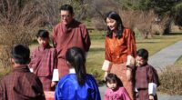 Bhutan's glamorous Queen Jetsun Pema makes rare public appearance alongside her three children to mark New Year