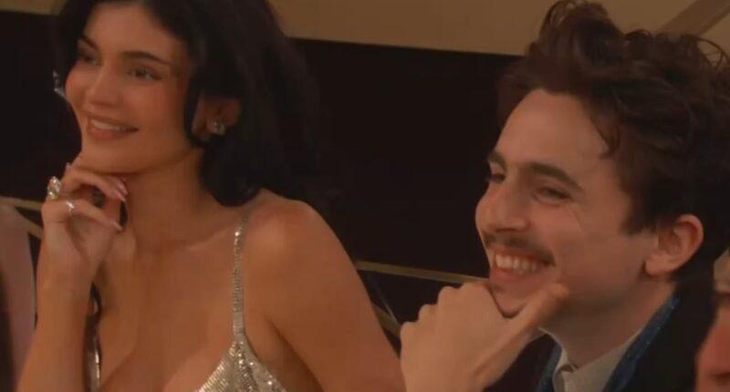 Busty Kylie Jenner joins boyfriend Timotheé Chalamet inside the 2025 Golden Globes after skipping red carpet