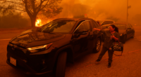 California fires update: Homes were burning and roads already jammed when Pacific Palisades evacuation order came, AP finds