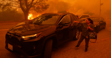 California fires update: Homes were burning and roads already jammed when Pacific Palisades evacuation order came, AP finds