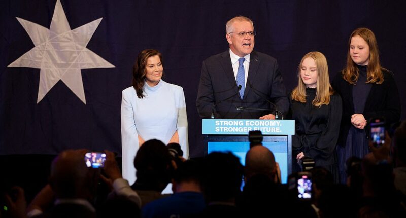 Pictured: Jenny Morrison appeared with her husband and children as the outgoing Prime Minister addressed his party colleagues and the media