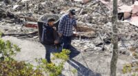 Emotional Mel Gibson surveys the smoldering remains of his Malibu house after firefighter made bombshell claim