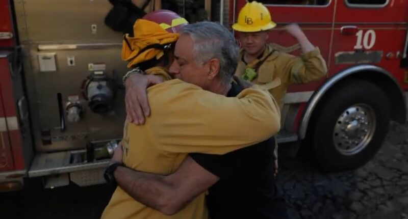 Emotional moment Palisades homeowner breaks down in tears when he finds his house miraculously escaped damage and hugs the firefighters who saved it 