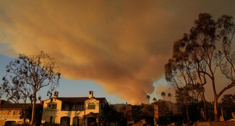 Firefighters race to contain Los Angeles wildfires with menacing winds forecast to return