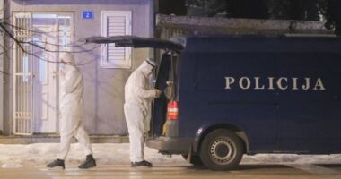 Police investigators work at the site of a shooting in Cetinje, 36 kilometers (22 miles) west of Podogrica, Montenegro, Wednesday, Jan 1, 2025. (AP Photo/Risto Bozovic)