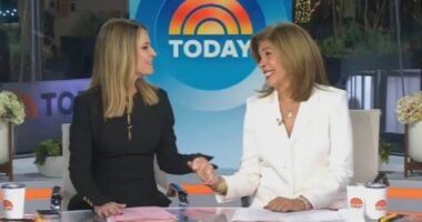 Hoda Kotb chokes up as she kicks off last episode on the Today show while holding hands with Savannah Guthrie