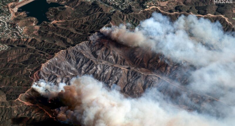 LA braces for 50mph winds set to fan deadly flames that killed 16 as out-of-control blaze heads towards key exit road