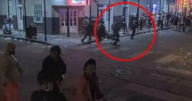 Moment brave New Orleans cops rush to scene of terror attack after suspect kills ten in rampage & opens fire on police