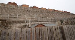 Our £180k newbuild homes are mocked because of our giant 40ft 'privacy' fence...snobs have compared it to the TITANIC