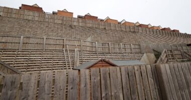 Our £180k newbuild homes are mocked because of our giant 40ft 'privacy' fence...snobs have compared it to the TITANIC