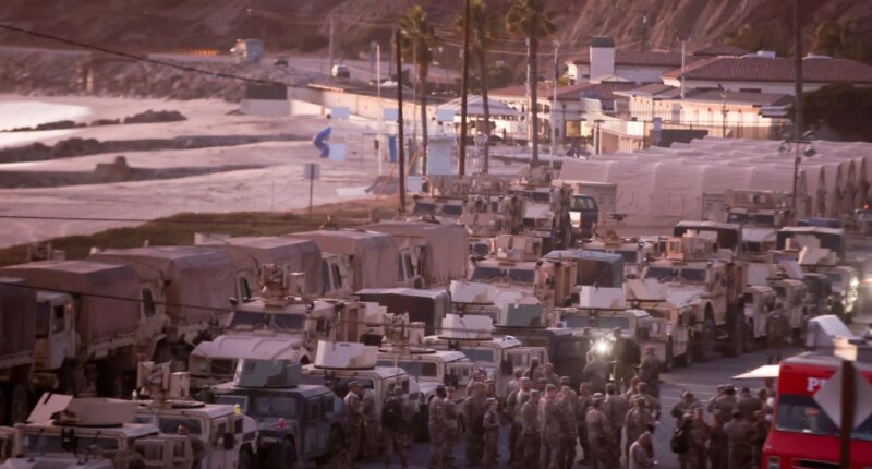 Over 2,500 soldiers sent to tackle LA’s fires and halt looting as they set up base on beach