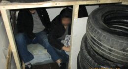 People smugglers JAILED after trying to sneak men into the UK crammed in makeshift den underneath pile of dirty tyres