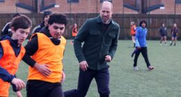 Prince William enjoys a football game during visit to youth hub in Toxteth - and makes a light-hearted joke about his skills