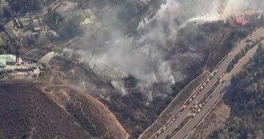 Residents evacuated as brush fire threatens homes near San Diego