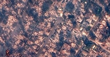 Satellite pics show whole blocks burned to rubble after LA wildfires sparked in backyard…& 5 blazes still out of control