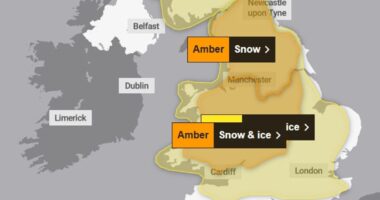 Snow warning is upgraded to amber for Britain: Met Office says 16in wintry showers and freezing rain could cause chaos this weekend with alerts in place for most of the UK