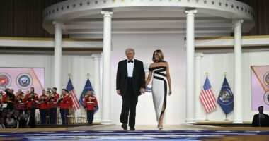 Trump and Melania send crowd wild at Commander in Chief inaugural ball, with first lady in mesmerizing leggy gown